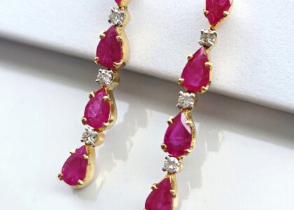 Gouden Sieraden met Edelstenen